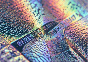 Holographic security label reflecting light on cosmetic packaging